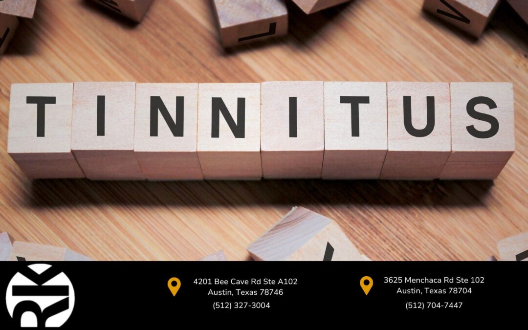 a scrabble tile formed the word tinnitus